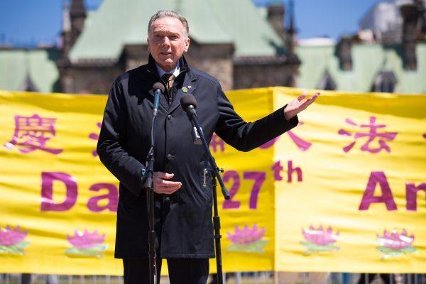 Conservative MP and former cabinet minister Peter Kent speaks at an event celebrating the anniversary of the public introduction of Falun Dafa, also known as Falun Gong, on Parliament Hill in Ottawa on May 8, 2019. (Evan Ning/The Epoch Times)