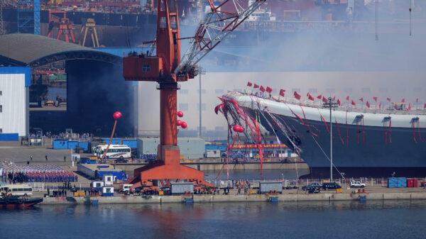 Type 001A, China's second aircraft carrier, is transferred from the dry dock into the water during a launch ceremony at Dalian shipyard in Dalian, northeast China's Liaoning Province, on April 26, 2017. (AFP via Getty Images)