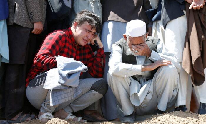 Afghan School Blast Toll Rises to 68, Families Bury Victims