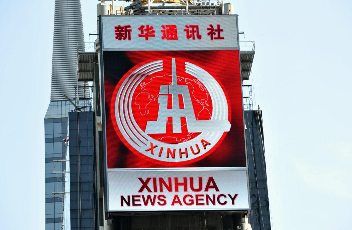 A new electronic billboard leased by Xinhua, the news agency operated by the Chinese regime, makes its debut in New York's Times Square on Aug. 1, 2011. The LED sign is 60 feet (18.3 meters) by 40 feet (12.2 meters) and is located on the building at 2 Times Square. (Stan Honda/AFP via Getty Images)