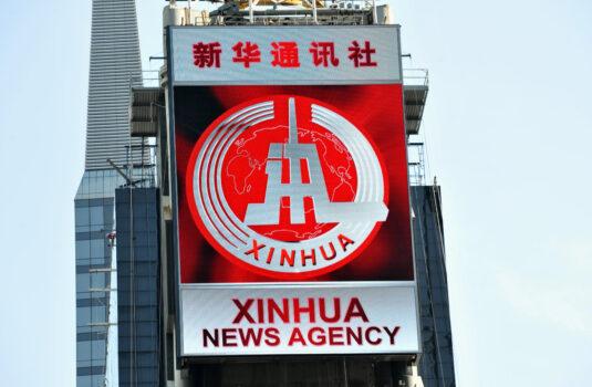 An electronic billboard leased by Xinhua, the news agency operated by the Chinese regime, makes its debut Aug. 1, 2011, in New York's Times Square. The LED sign is 60 feet (18.3 meters) by 40 feet (12.2 meters) and is located on the building at 2 Times Square. (Stan Honda/AFP via Getty Images)