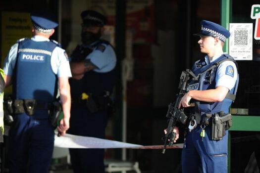 Police officers are observed standing guard outside the main entrance of the Dunedin Central Countdown in Dunedin, New Zealand, on May 10, 2021. Four people have been injured - three critically - after a man started stabbing shoppers at the Countdown supermarket in St. Cumberland. (Joe Allison/Getty Images)