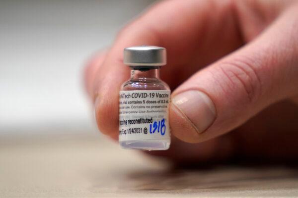 A vial of the Pfizer vaccine for COVID-19 in Seattle, Wash., on Jan. 24, 2021. (Ted S. Warren/AP Photo)