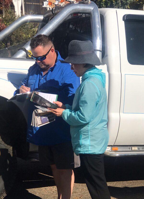 A truck driver signed on the End CCP petition in Taralga, NSW, Australia.