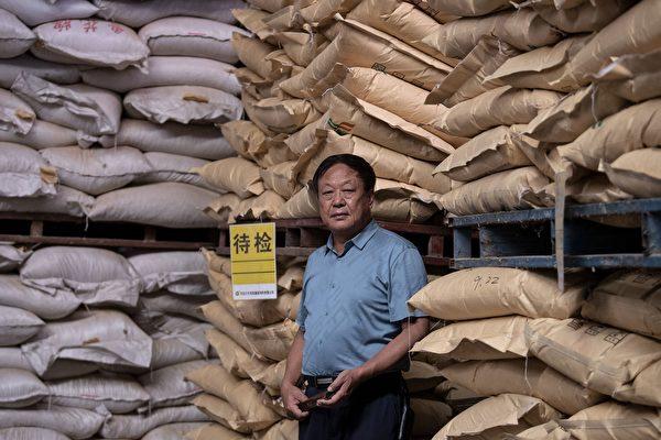 Chinese entrepreneur Sun Dawu is at a feed warehouse in his Dawu Group in Hebei Province, China, on Sept. 24, 2019. (Noel Celis/AFP via Getty Images)