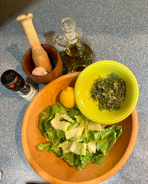 Salad dressing ingredients, with the author's parents' mortar and pestle. (Courtesy of Valerie A. Winters)