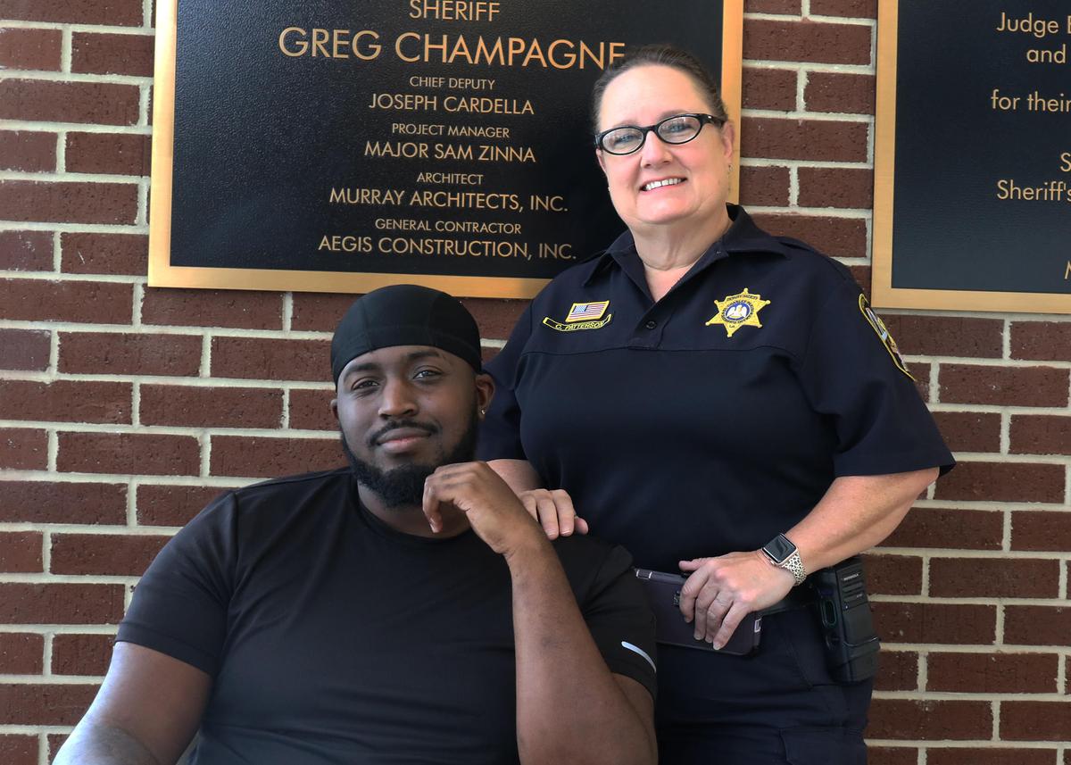 Brandon Jarrow (L) with St. Charles Parish Sheriff’s Deputy Connie Patterson. (Courtesy of <a href="https://www.stcharlessheriff.org/">St. Charles Parish Sheriff’s Office</a>)