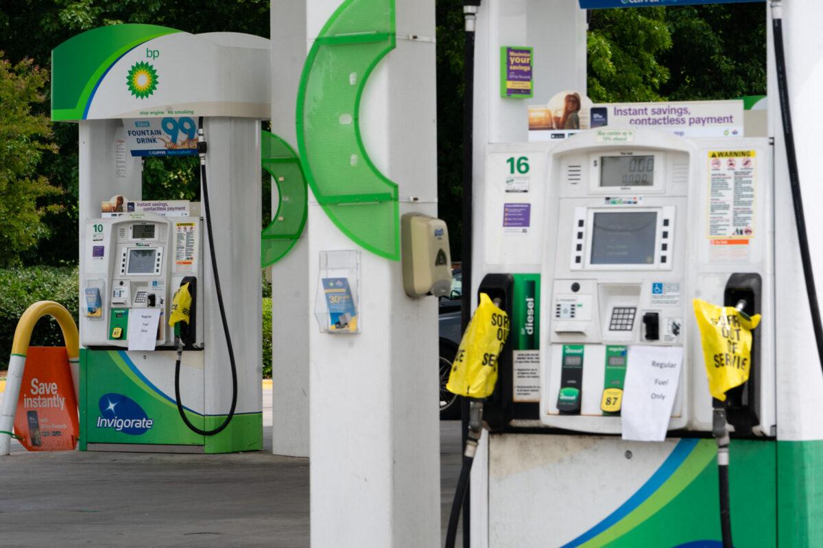 Empty gasoline pumps are put out of service at a BP gas station in Smyrna, Ga., on May 11, 2021. (Elijah Nouvelage/AFP via Getty Images)