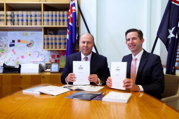 Treasurer Josh Frydenberg and Finance Minister Simon Birmingham with the 2021 budget papers at Parliament House on May 11, 2021, in Canberra, Australia. (Dominic Lorrimer - Pool/Getty Images)