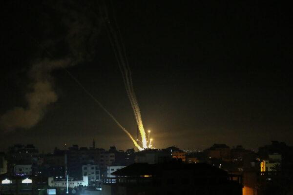 Rockets are launched by Palestinian militants into Israel, in Gaza, on May 12, 2021. (Ibraheem Abu Mustafa/Reuters)