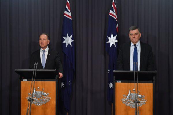 Minister for Health Greg Hunt and Department of Health Secretary Dr Brendan Murphy at a press conference at Parliament House in Canberra, Australia, May 13, 2021. (AAP Image/Mick Tsikas)