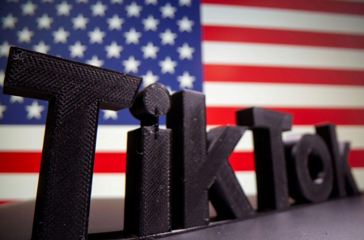 A 3D printed Tik Tok logo is seen in front of U.S. flag in this illustration taken Oct. 6, 2020. (Dado Ruvic/Illustration/Reuters)