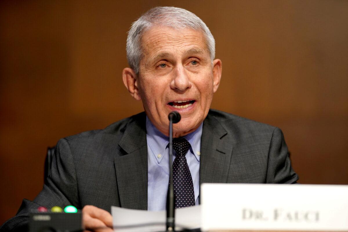 Dr. Anthony Fauci, director of the National Institute of Allergy and Infectious Diseases, gives an opening statement during a Senate Health, Education, Labor and Pensions Committee hearing to discuss the on-going federal response to COVID-19, at the U.S. Capitol in Washington, D.C., U.S., May 11, 2021. (Greg Nash/Pool via Reuters/File Photo)