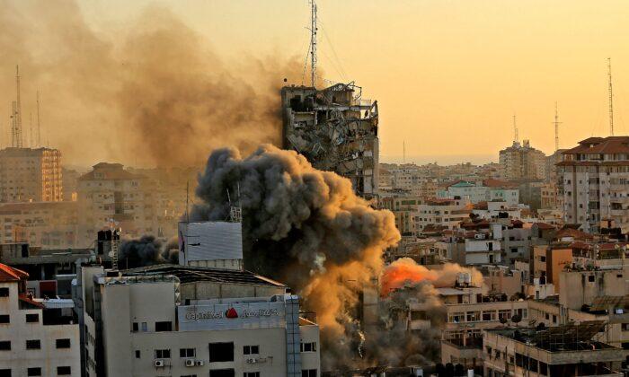 Photos: 14-Story Tower in Gaza Collapses Amid Israeli Airstrikes