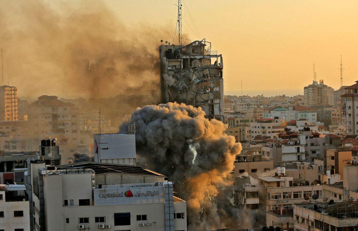 Other than the Al-Sharouk tower, seen above, several other buildings were struck in Gaza this week by Israeli Defense Forces. (Qusay Dawud/AFP via Getty Images)