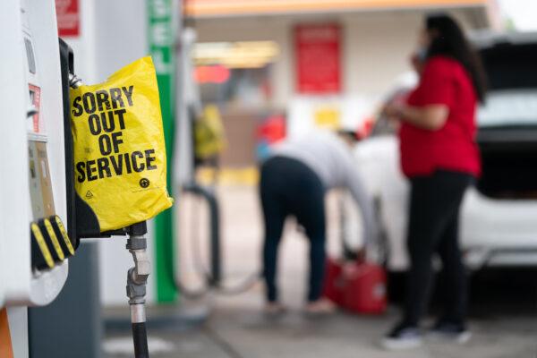  An out of service bag covers a pump handle at a gas station in Fayetteville, North Carolina, on May 12, 2021. (Sean Rayford/Getty Images)