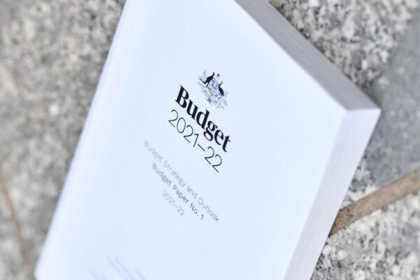 A stock image of the 2021-2022 Australian Budget is seen on the ground at Parliament House on May 12, 2021, in Canberra, Australia. (Sam Mooy/Getty Images)