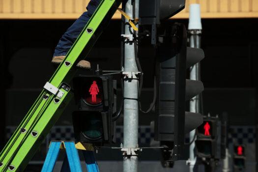 Female traffic light signals being installed at the intersection of Swanston and Flinders streets in Melbourne, Australia, on March 7, 2017. (Stefan Postles/Getty Images)