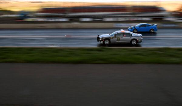 Colorado State Patrol Trooper Josh Lewis races at Bandimere Speedway west of Denver, Colo., on May 5, 2021. (Thomas Peipert/AP Photo)