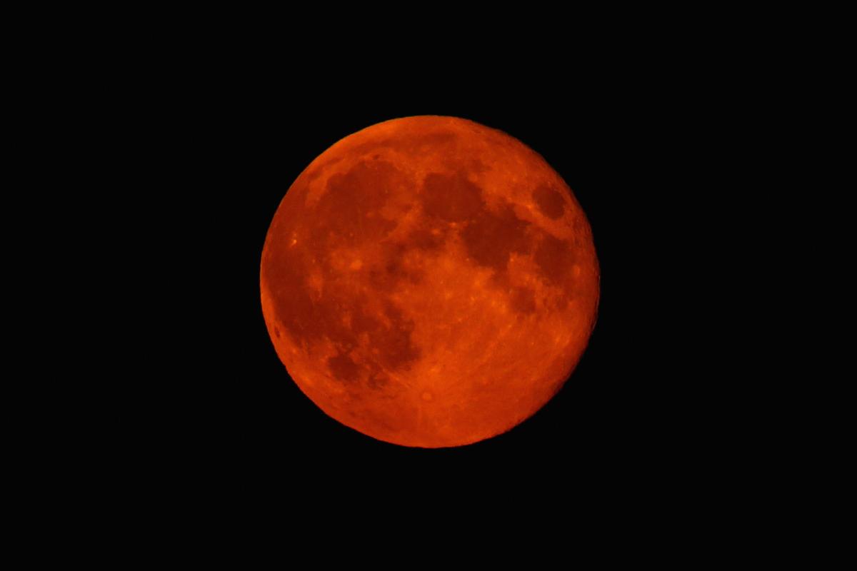 A blood-red supermoon rising over High Wycombe, England, on Sept. 9, 2014. (Richard Heathcote/Getty Images)