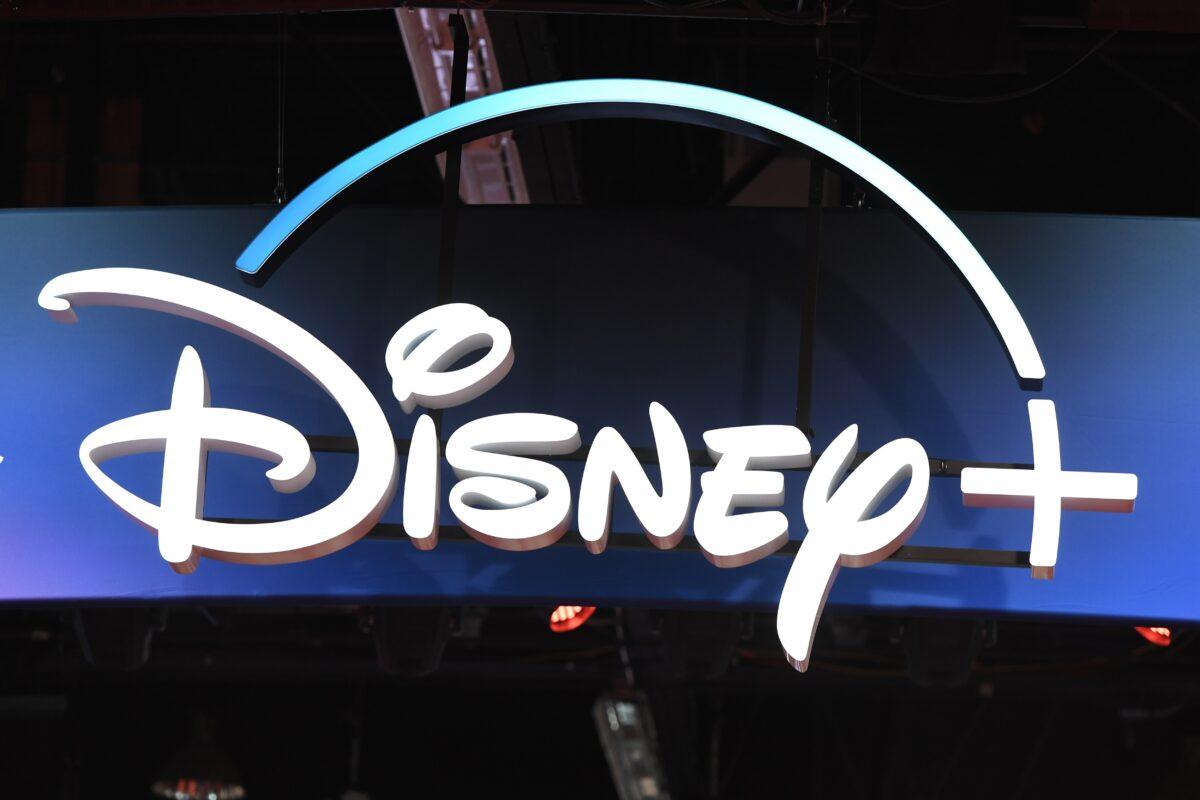 A Disney+ streaming service sign is pictured at the D23 Expo, billed as the "largest Disney fan event in the world," at the Anaheim Convention Center in Anaheim, Calif., on Aug. 23, 2019. (Robyn Beck/AFP via Getty Images)