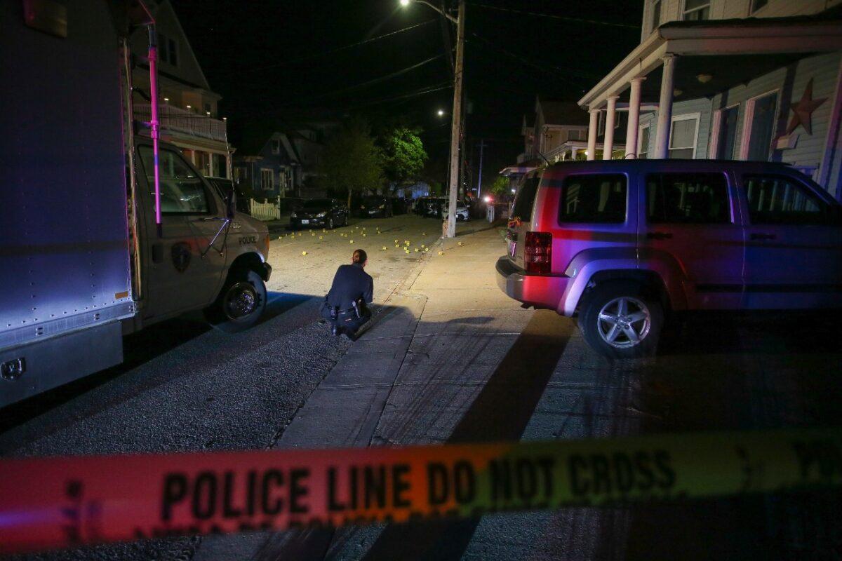 Providence Police investigate a shooting on Carolina Avenue, late Thursday, in Providence, R.I., on May 13, 2021. (Stew Milne/AP Photo)