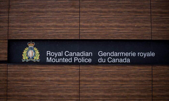 The RCMP logo is seen outside an RCMP building in Surrey, B.C., on April 13, 2018. (Darryl Dyck/The Canadian Press)