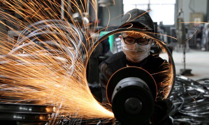 China’s Factory Output Slows as Bottlenecks Crimp Production