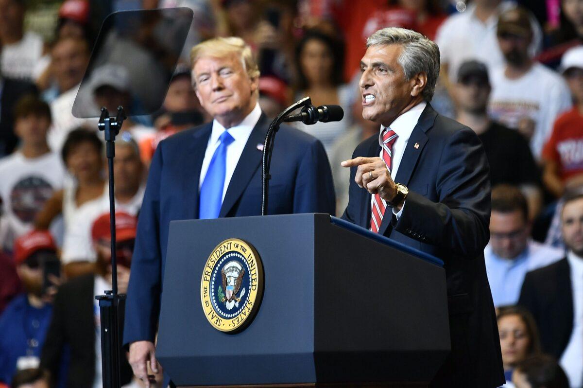 Republican Senate candidate Lou Barletta speaks in front of then-President Donald Trump at a political rally in Wilkes-Barre, Pa., on Aug. 2, 2018. (Mandel Ngan/AFP/Getty Images)