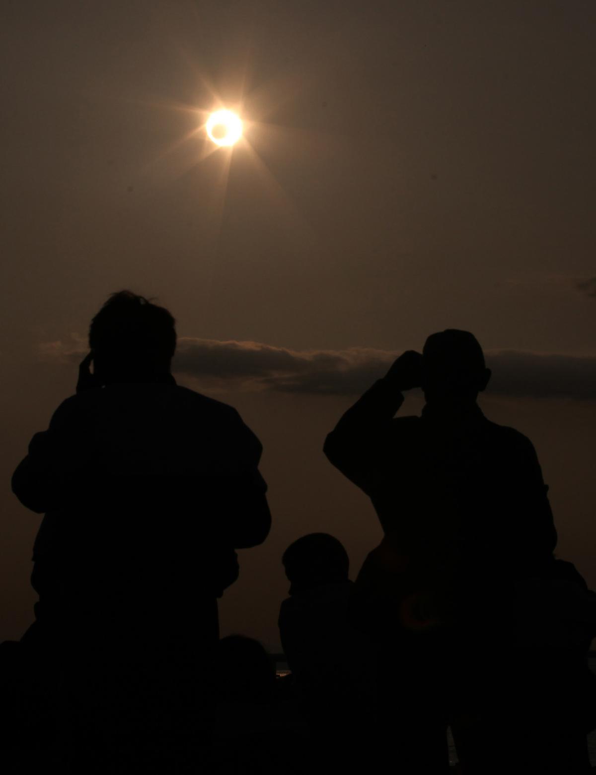 An annular solar eclipse is seen from the coast of Xiamen, in China's southeast province of Fujian, on May 21, 2012. (AFP/AFP/GettyImages)