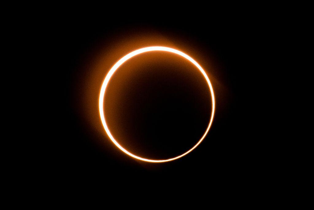 The Moon passes in front of the Sun in a rare "ring of fire" solar eclipse as seen from Tanjung Piai, Malaysia, on December 26, 2019. (SADIQ ASYRAF/AFP via Getty Images)