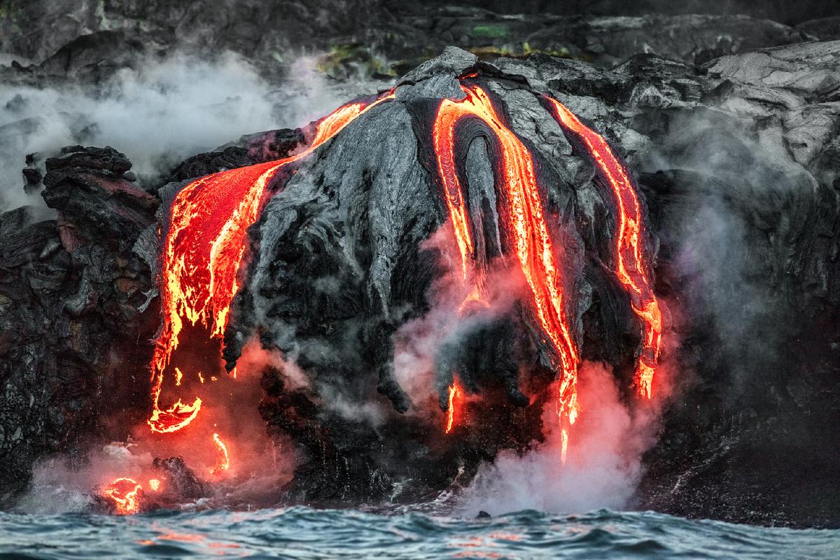 Lava from the Kilauea volcano flows into the sea on Hawaii's Big Island. (Courtesy of Alohaisland/Dreamstime.com)