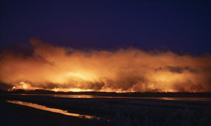 Saskatchewan Wildfire Grows, Forcing Evacuations in the Area to Expand