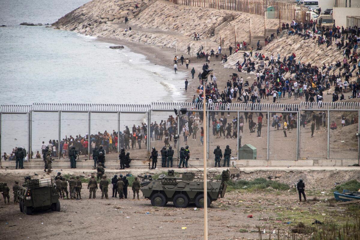 Spanish Army take positions at the border of Morocco and Spain, at the Spanish enclave of Ceuta, on May 18, 2021. (Javier Fergo/AP Photo)