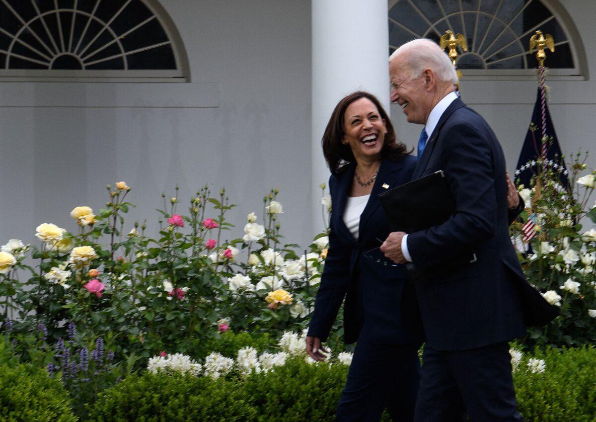 Vice President Kamala Harris and President Joe Biden leave after Biden delivered remarks on COVID-19 response and the vaccination program from the Rose Garden of the White House in Washington, D.C., on May 13, 2021. (Nicholas Kamm / AFP)