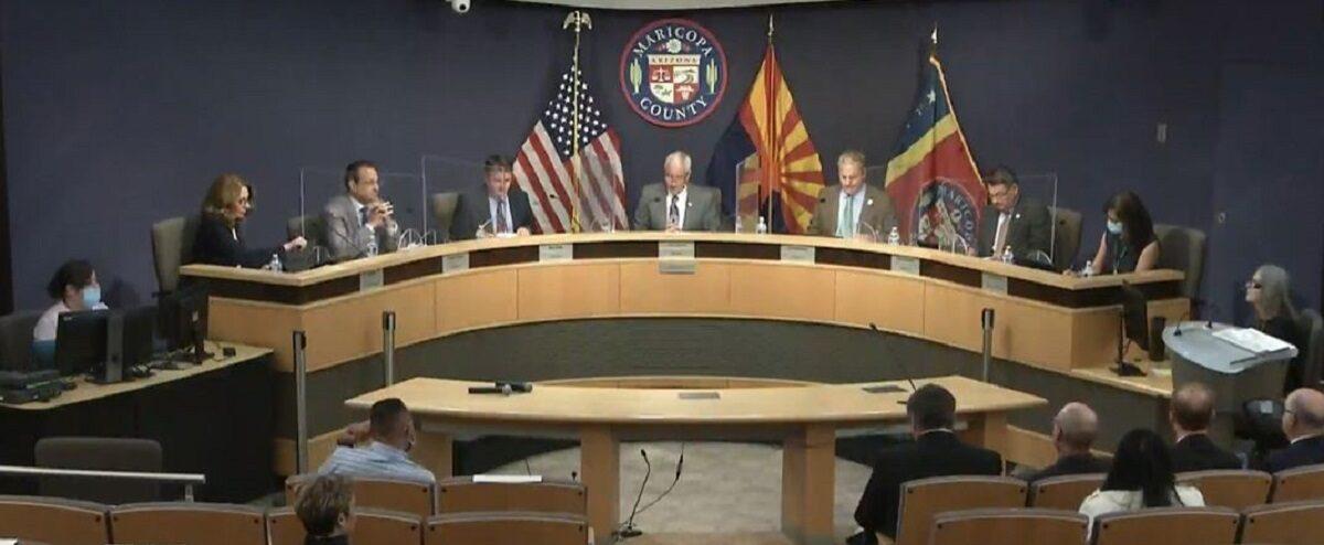 In this image from video captured from the Maricopa County Board of Supervisors website, Chairman Jack Sellers, center, and members hold a meeting regarding requests by the Arizona Senate in Maricopa County, Ariz., on May 18, 2021. (Screenshot via The Epoch Times)