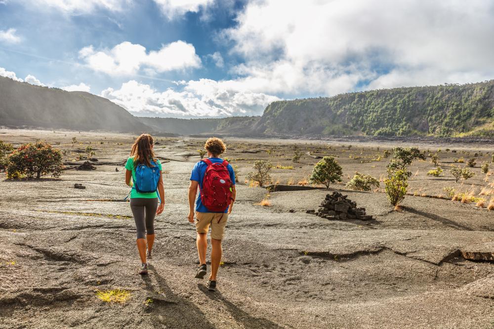 A couple of hikers on the Kilauea Iki crater trail. (Maridav/Shutterstock)