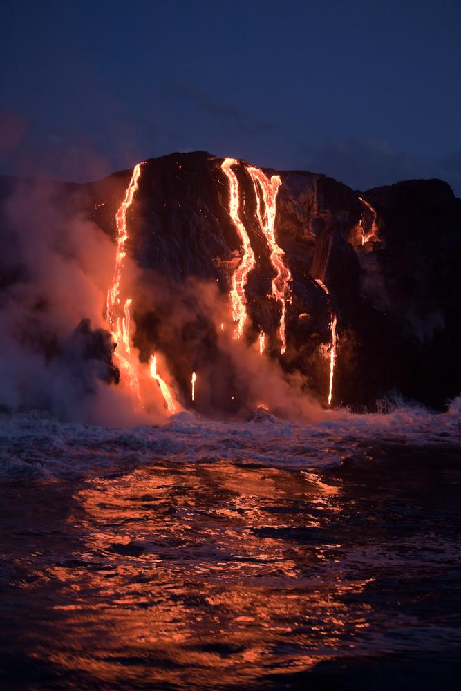 Hot lava flows into the ocean. (Peter Zurek/Shutterstock)