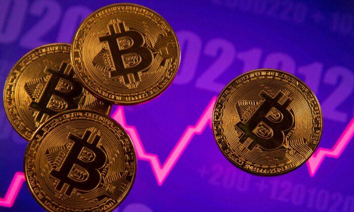 Bitcoin Tops $60,000, Nears Record High, on Growing US ETF Hopes