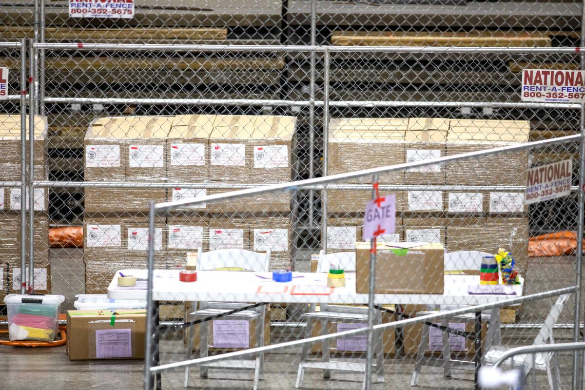 Ballots from the 2020 general election wait to be counted at Veterans Memorial Coliseum in Phoenix, on May 1, 2021. (Courtney Pedroza/Getty Images)