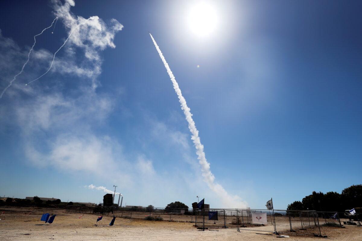 Israel's Iron Dome anti-missile system fires to intercept a rocket launched from the Gaza Strip towards Israel, as seen from Ashkelon, southern Israel May 19, 2021. (Ammar Awad/Reuters)
