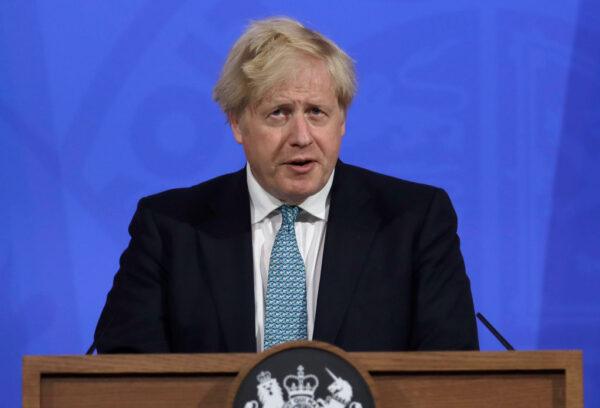 Britain's Prime Minister Boris Johnson speaks at a press conference on May 14, 2021, in London, England. (Matt Dunham-WPA Pool/Getty Images)