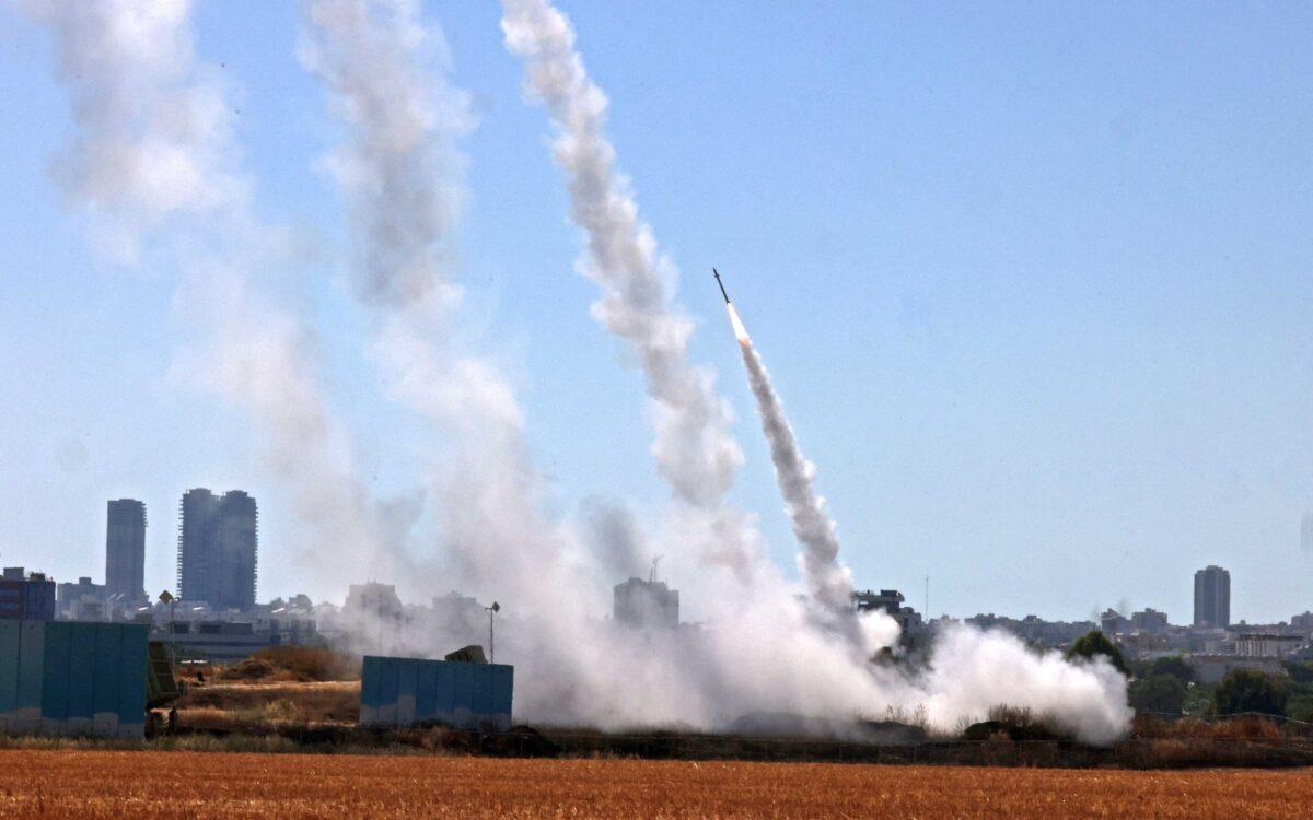 Israel's Iron Dome aerial defense system is activated to intercept a rocket launched from the Gaza Strip, controlled by the Palestinian Hamas movement, above the southern Israeli city of Ashdod, on May 12, 2021. (Emmanuel Dunand/AFP via Getty Images/TNS)
