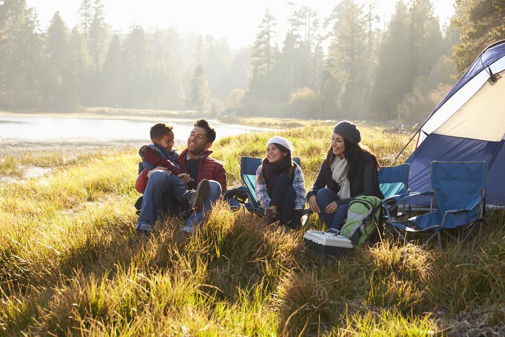 Camping is a fun economically friendly lodging option. (Monkey Business Images/Shutterstock)