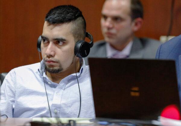 Cristhian Bahena Rivera listens to testimony that has been translated into Spanish by an interpreter during his trial at the Scott County Courthouse in Davenport, Iowa, on May 20, 2021 (Jim Slosiarek/The Gazette via AP, Pool)