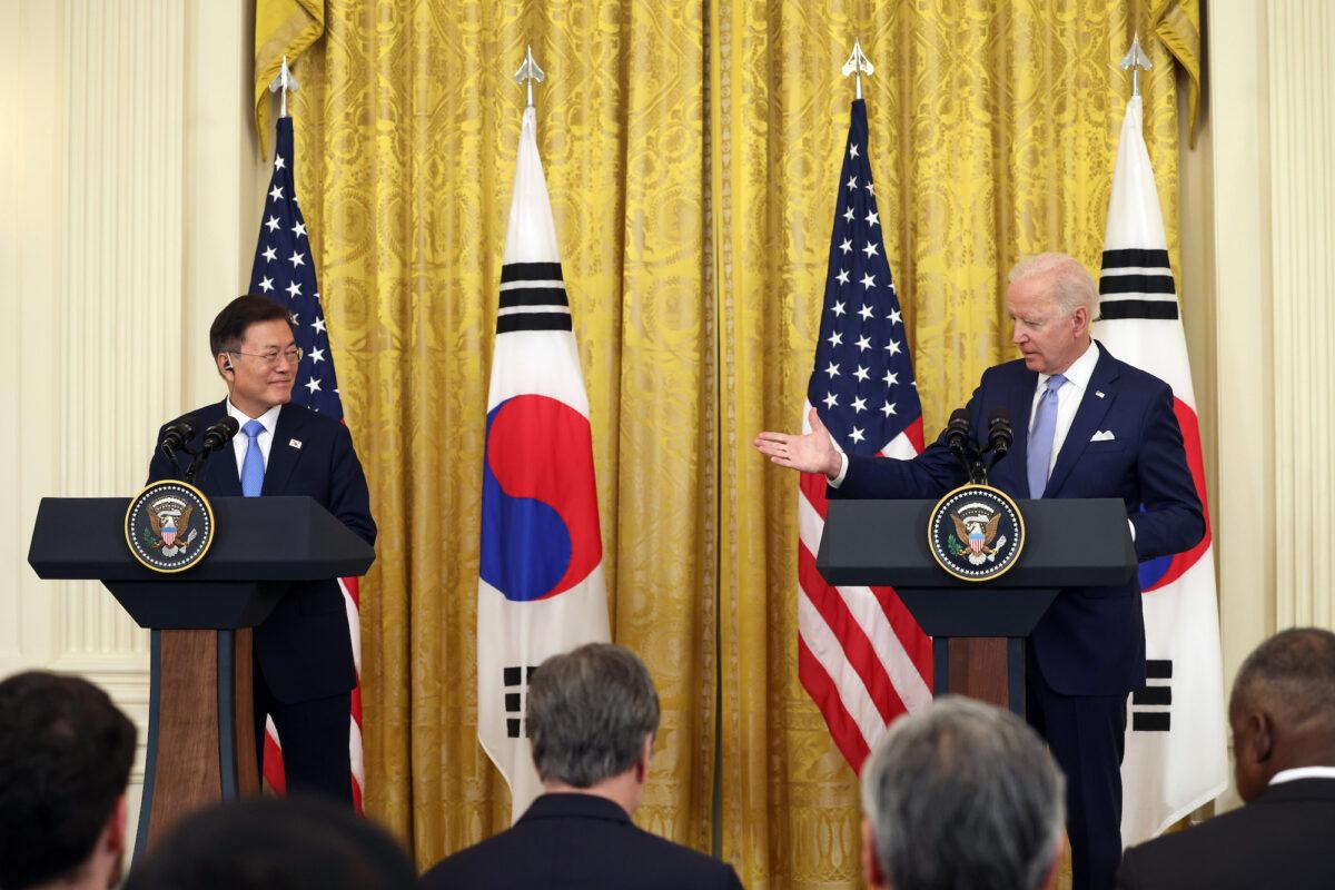 President Joe Biden (R) and South Korean President Moon Jae-in participate in a joint press conference in the East Room of the White House in Washington on May 21, 2021. (Anna Moneymaker/Getty Images)