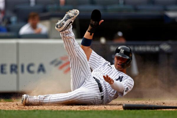 New York Yankees' Gleyber Torres scores a run in the seventh inning of a baseball game against the Chicago White Sox in New York on May 22, 2021. (Adam Hunger/AP Photo)