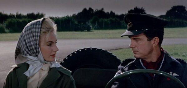 A possible romance is introduced between Hilde Bergman (Maria Perschy) and Roy Grant (Cliff Robertson), in “633 Squadron.” (United Artists)