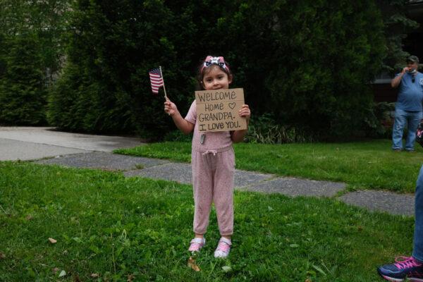 A young girl at the annual Memorial Day Parade in Staten Island, N.Y., on May 25, 2020. (Spencer Platt/Getty Images)