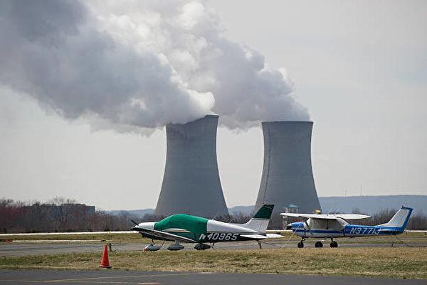 Cooling towers from the Limerick Generating Station, a nuclear power plant in Pottstown, Pa., seen from nearby Pottstown-Limerick Airport. (STAN HONDA/AFP via Getty Images)